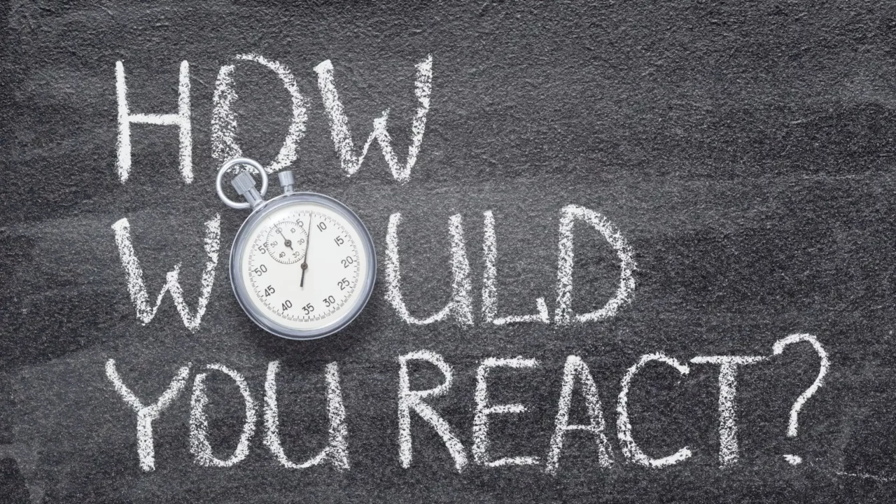 No Panic Training. A text on a blackboard saying how would you react
